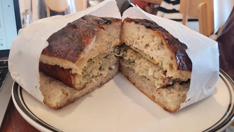 A fish sandwich cut in half