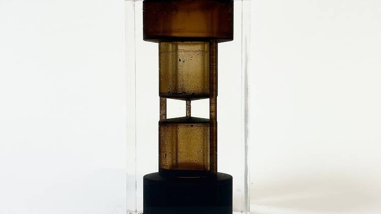 Clear paperweights filled with crude oil