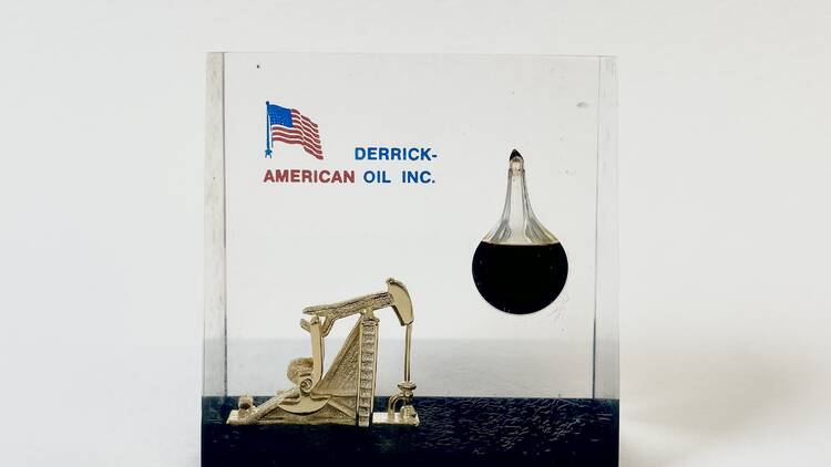 Crude oil encased in an American Oil paperweight