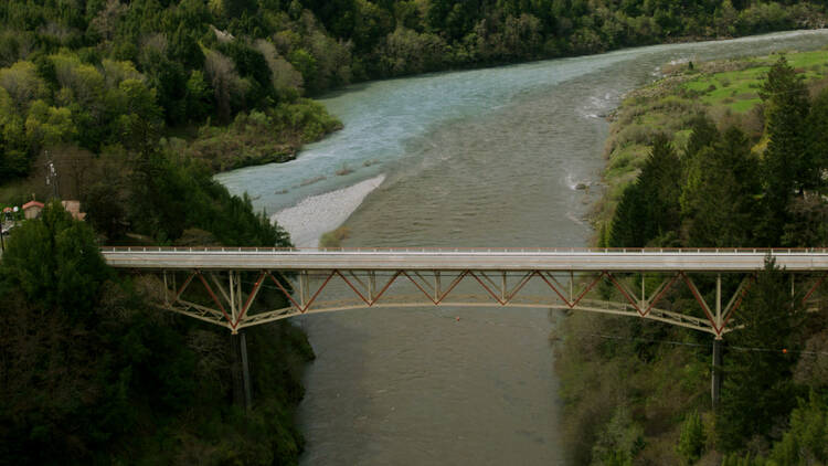 Film still showing a concrete dam along the Klamath River in Northern California Film still showing a concrete dam along the Klamath River in Northern California