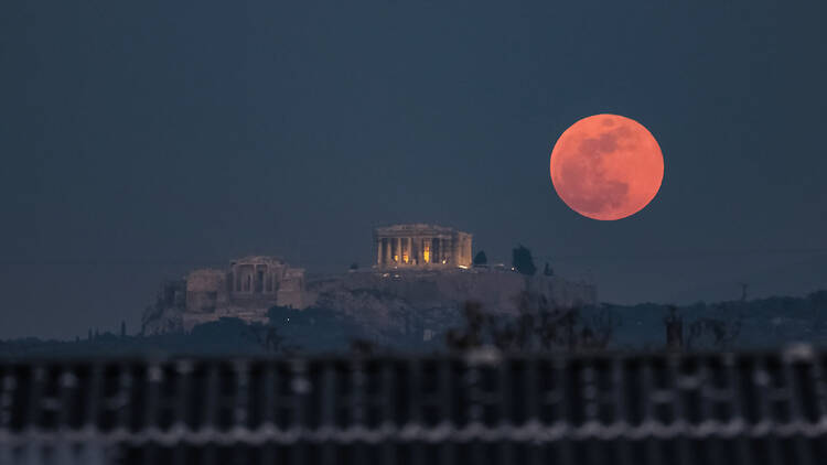 Blood moon above the Acropolis in Athens