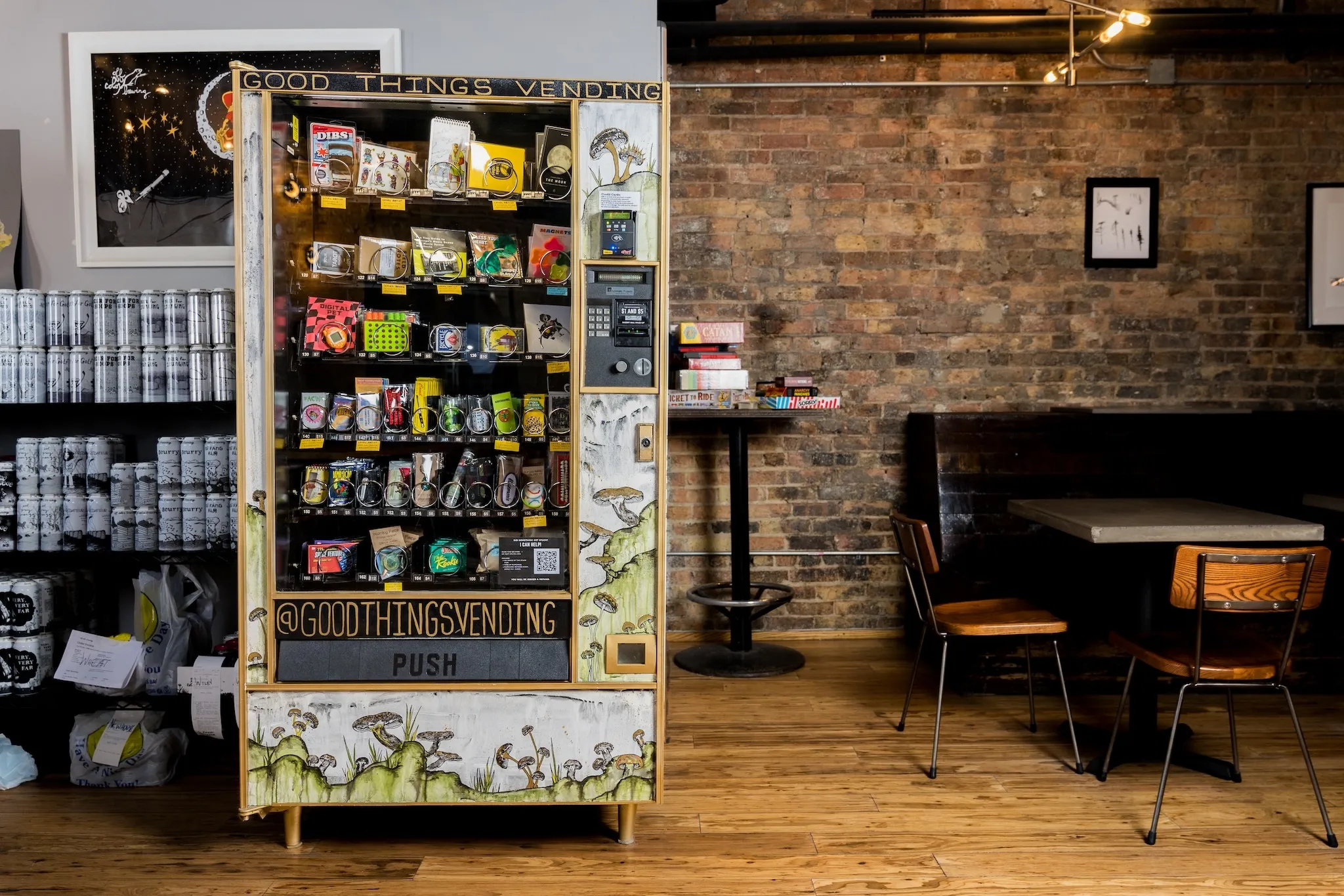 A painted vending machine stands before a brick wall at Off Color Brewing's Mousetrap.