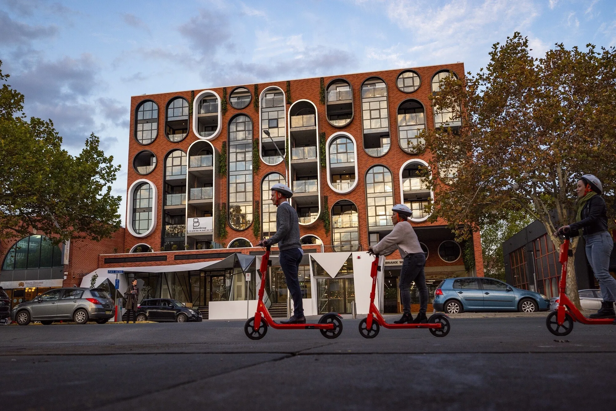 People on scooters on street