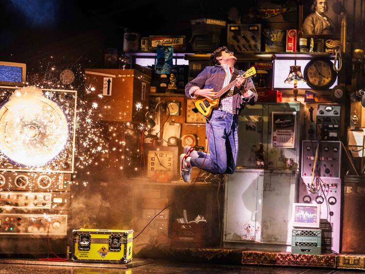 An actor jumping in Back to the Future: The Musical