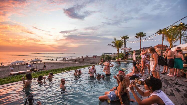 People in pool on beach