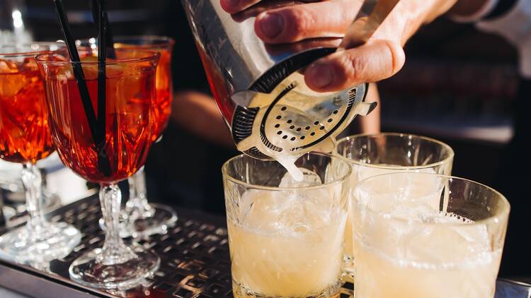Bartender making cocktails