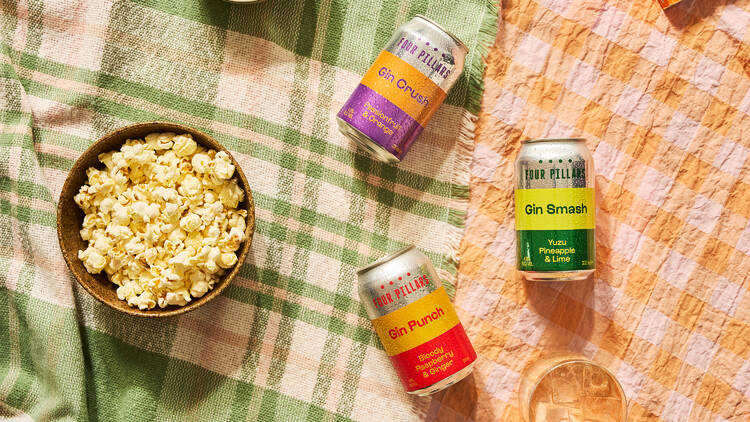 Four Pillars gin tins