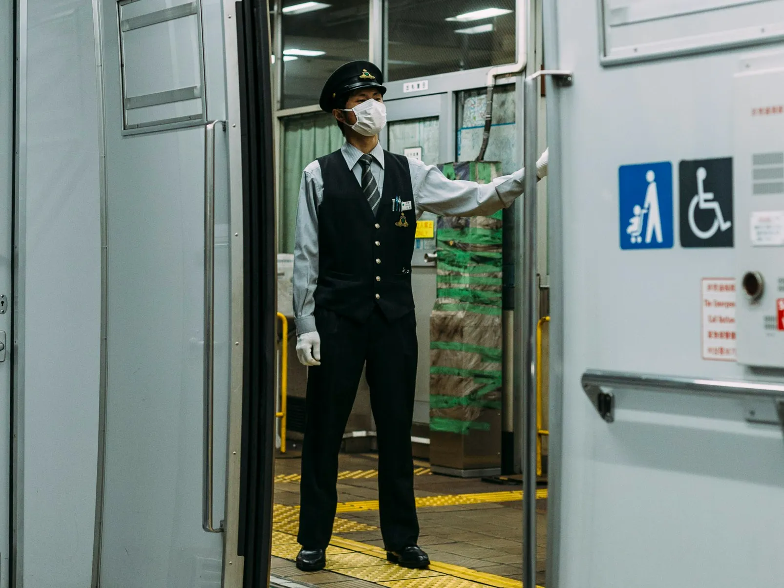 Railway employee standing on platform