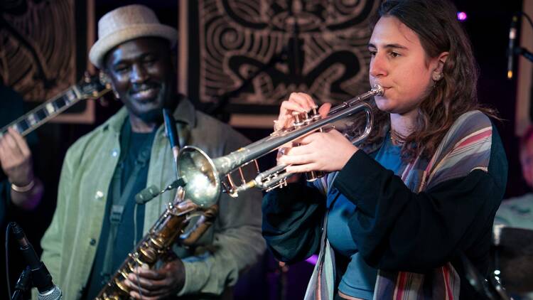 See live jazz at an underground crypt
