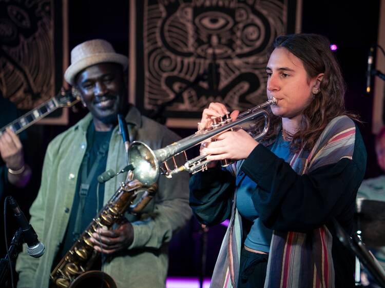 See live jazz at an underground crypt