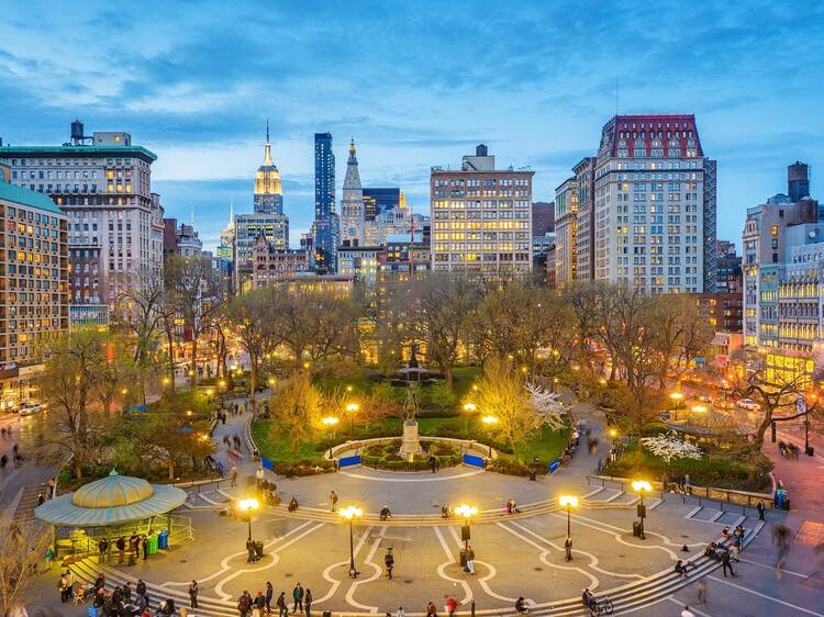 New York, New York, USA cityscape over Union Square in Lower Manhattan at twilight.