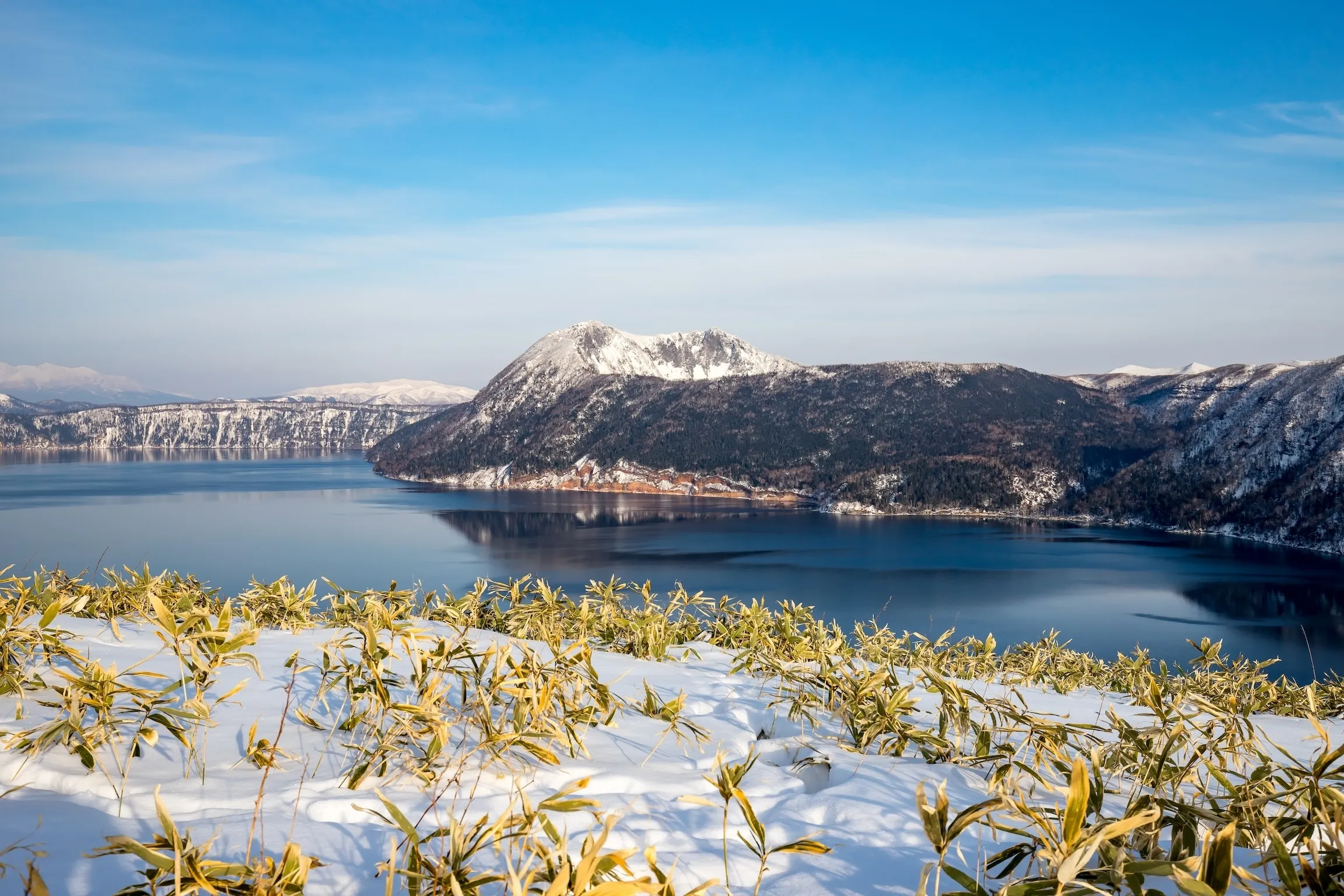 a panorama view of lake mashu in hokkaido japan