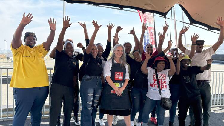 Delicious Festival Trader Academy graduates alongside Jean Huddy, Delicious Festival Traders Academy Festival Director