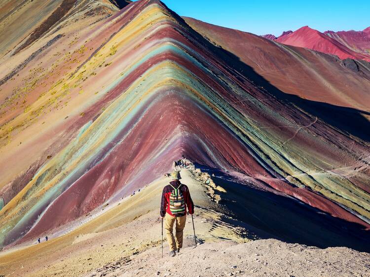 Hiking scene in Vinicunca, Cusco Region, Peru. Montana de Siete Colores,  Rainbow Mountain.