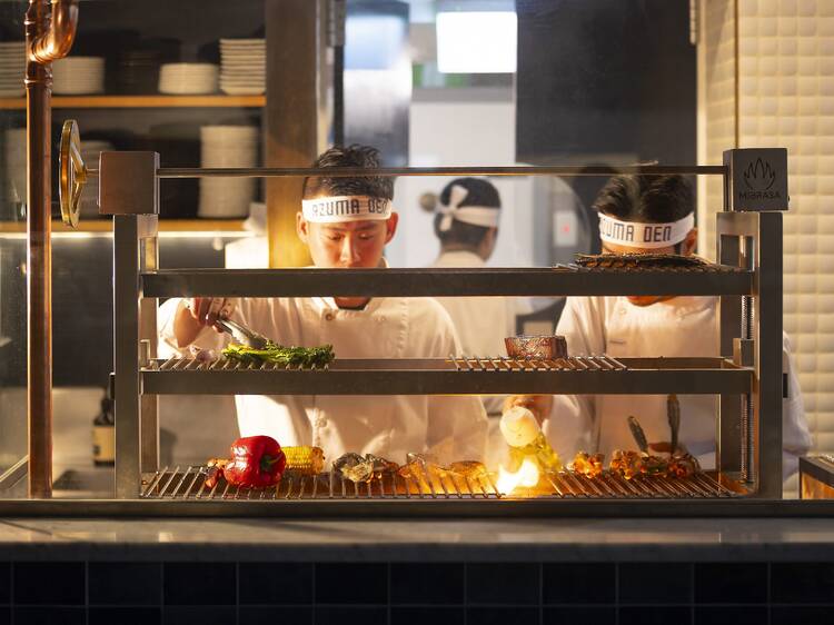 Two chefs at hibachi grill