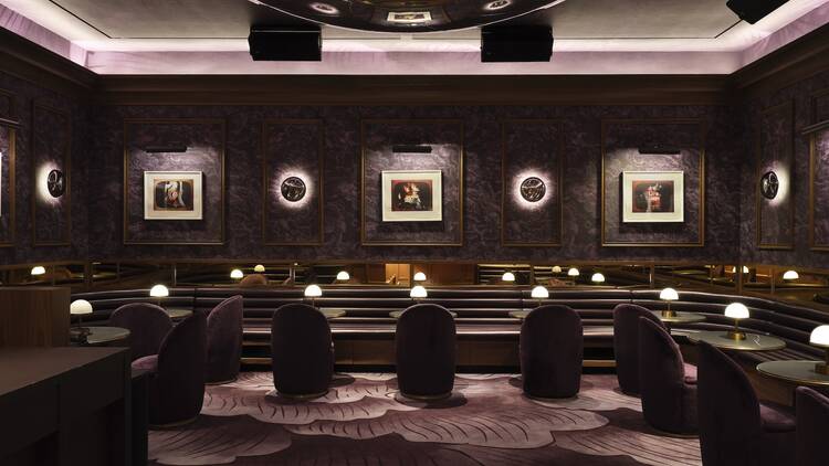 A purple cocktail bar with a silver dome up above
