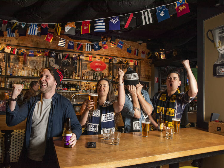 AFL fans watching football at the Duke of Wellington.