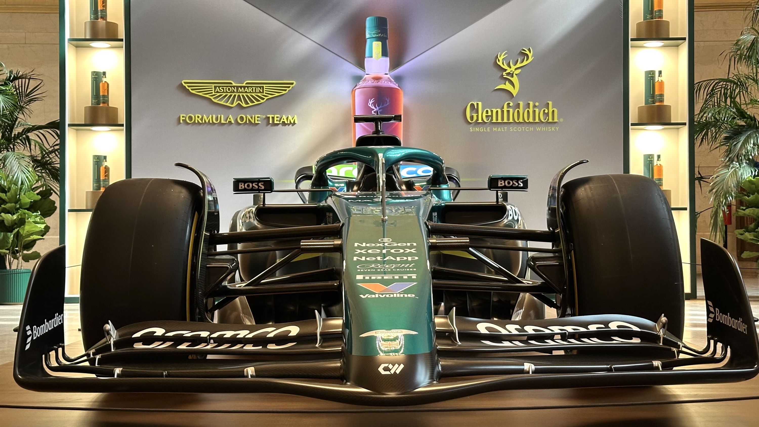 A close-up of a green Formula 1 racecar. 