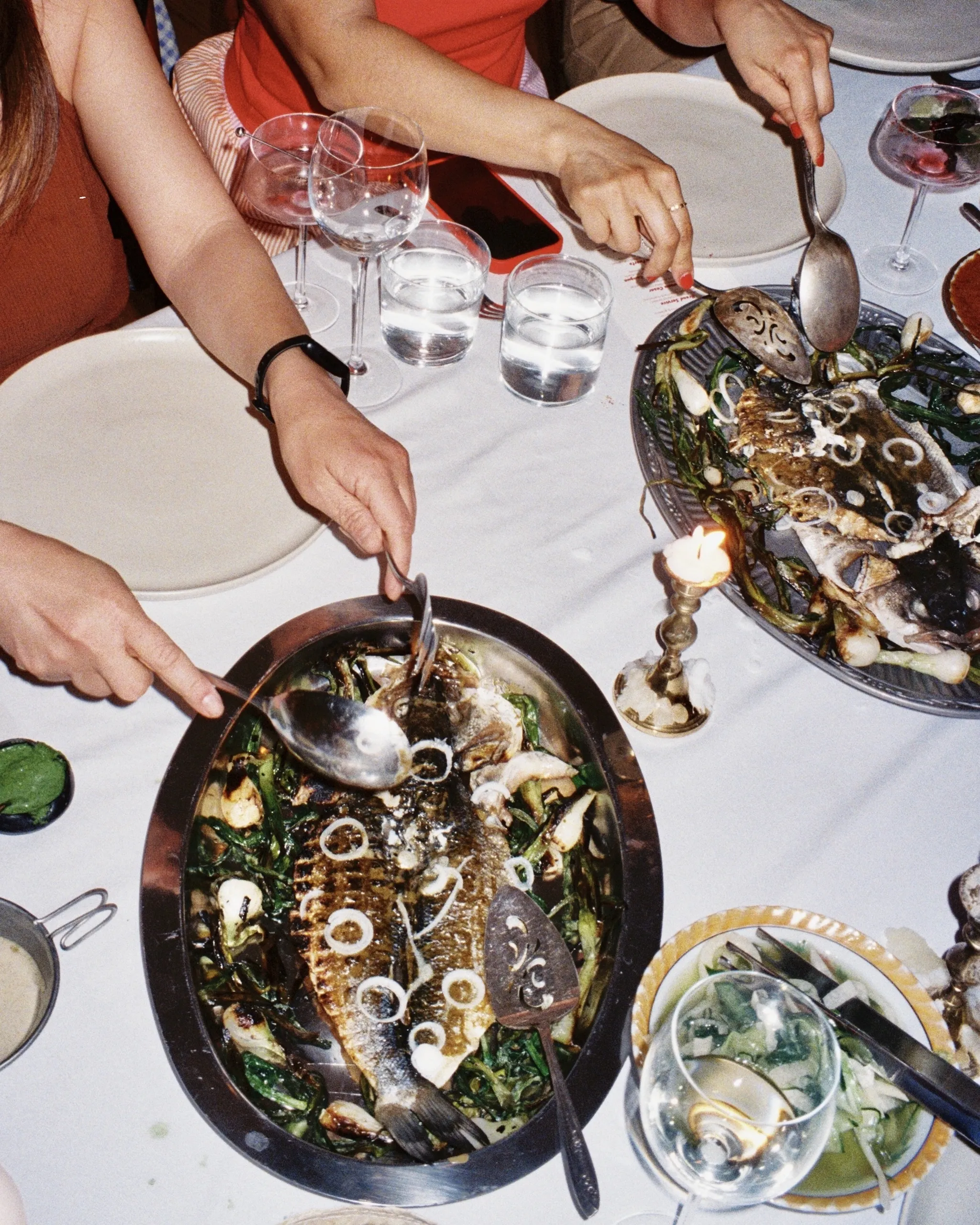 Diners serve themselves at a Second Helping Supper Club event.