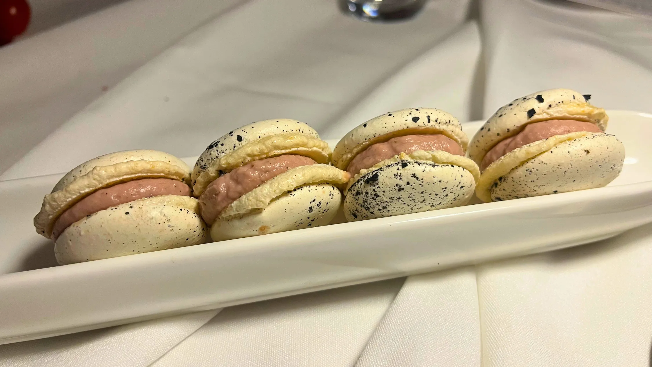Row of white macaroons
