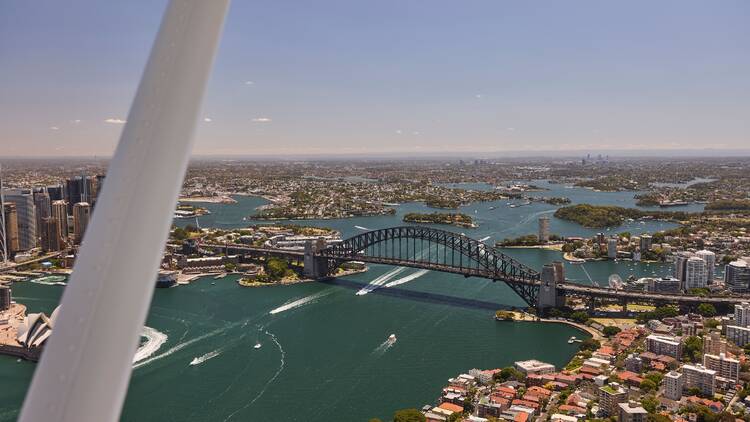 Scenic aerial view over Sydney Harbour during a Sydney Seaplanes flight .