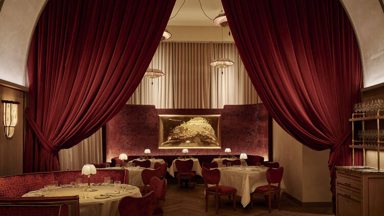 Red curtained dining room