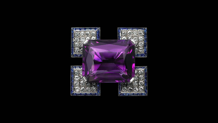An amethyst, sapphires and diamond brooch by Cartier.