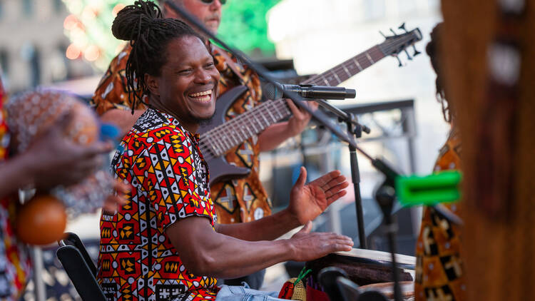 African Music and Cultural Festival A man playing the drums at the African Music and Cultural Festival.