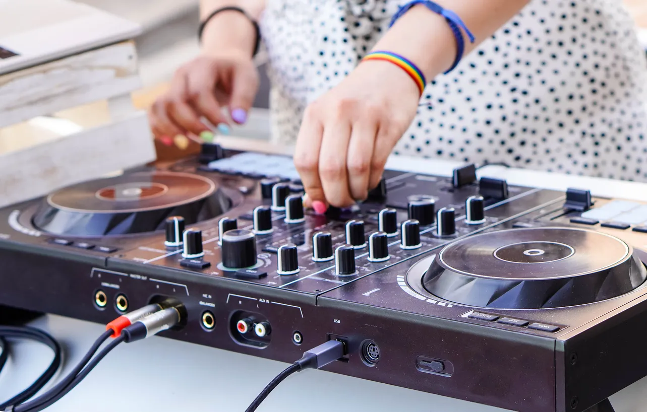 Dj playing music at pride summer party