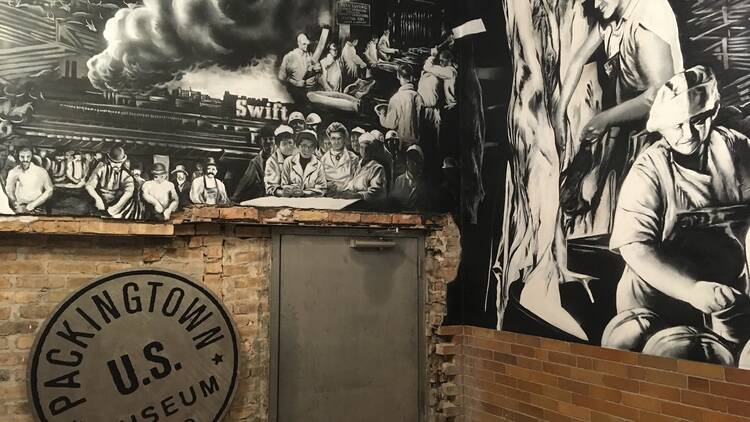The mural at the entrance to the Packingtown Museum. The mural at the entrance to the Packingtown Museum.