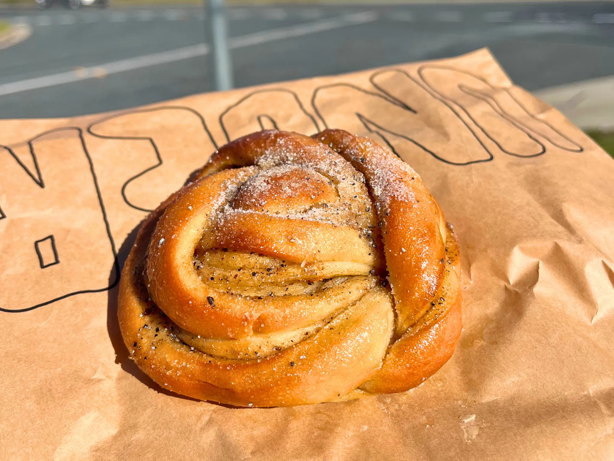 Bun on brown paper bag