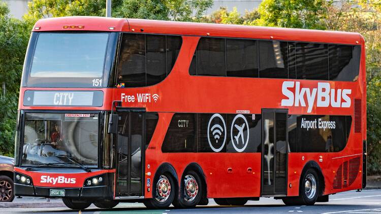 A red double-decker bus that says: SkyBus