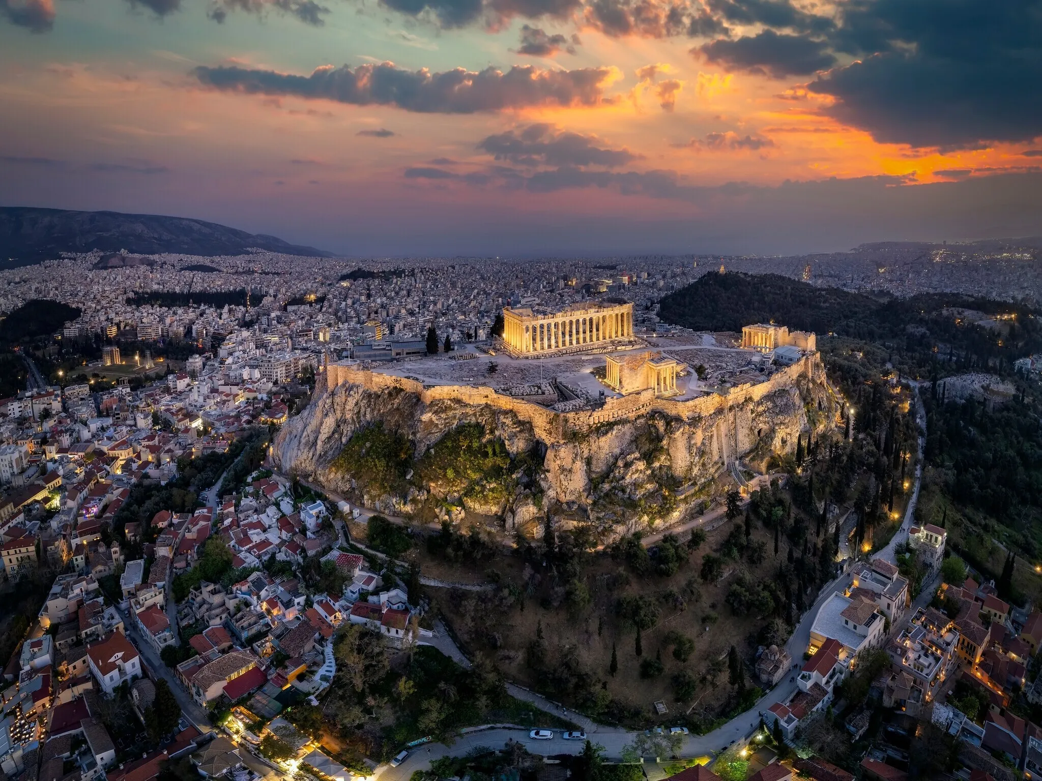 The Acropolis illuminated at sunset