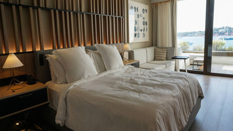 A bedroom at the Four Seasons Astir Palace in Athens A bedroom at the Four Seasons Astir Palace in Athens