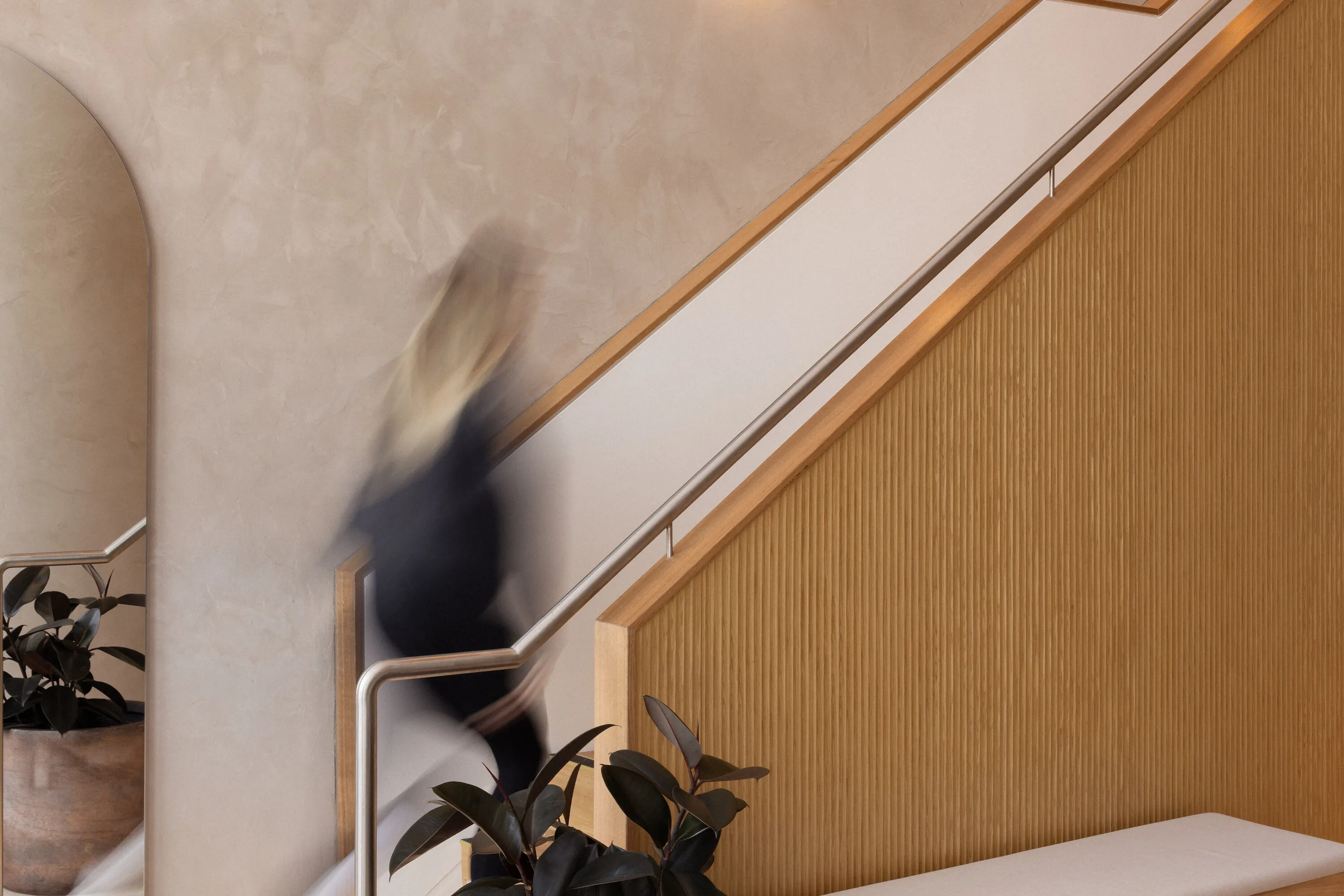 Lady walking up stairs