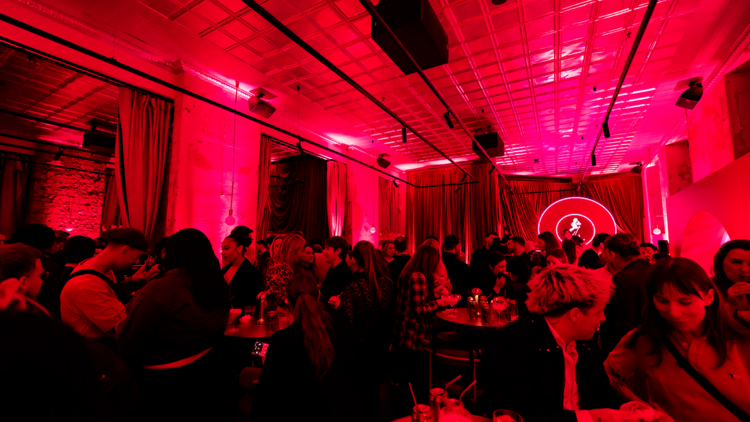 A neon-lit indoor party 