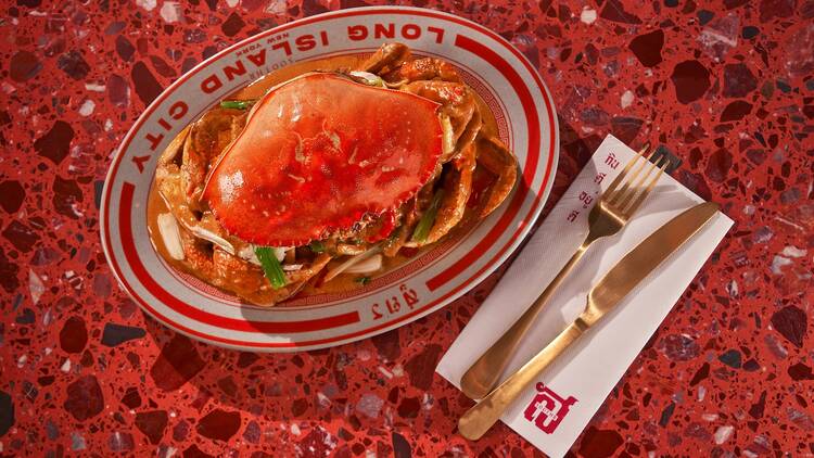 Dungness Crab on a plate on a red table