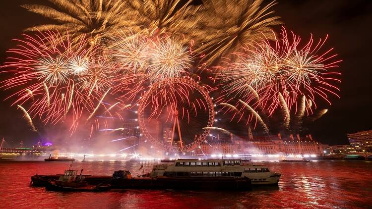 London Eye with New Year’s Eve fireworks