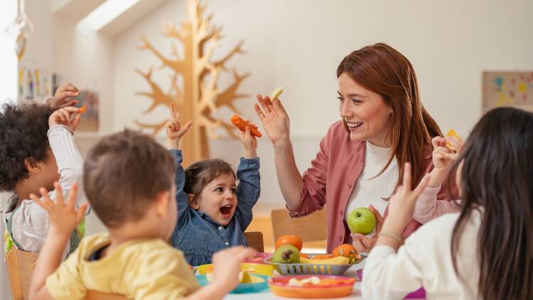 Teacher with a group of preschoolers