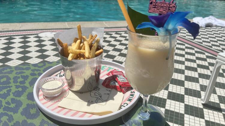 Lafayette Hotel San Diego Pool Bar Fries and a cocktail at the Lafayette Hotel San Diego Pool Bar.