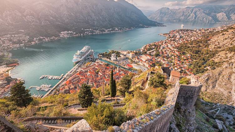 Aerial view of Kotor, Montenegro, with its historic fortress walls and Old Town