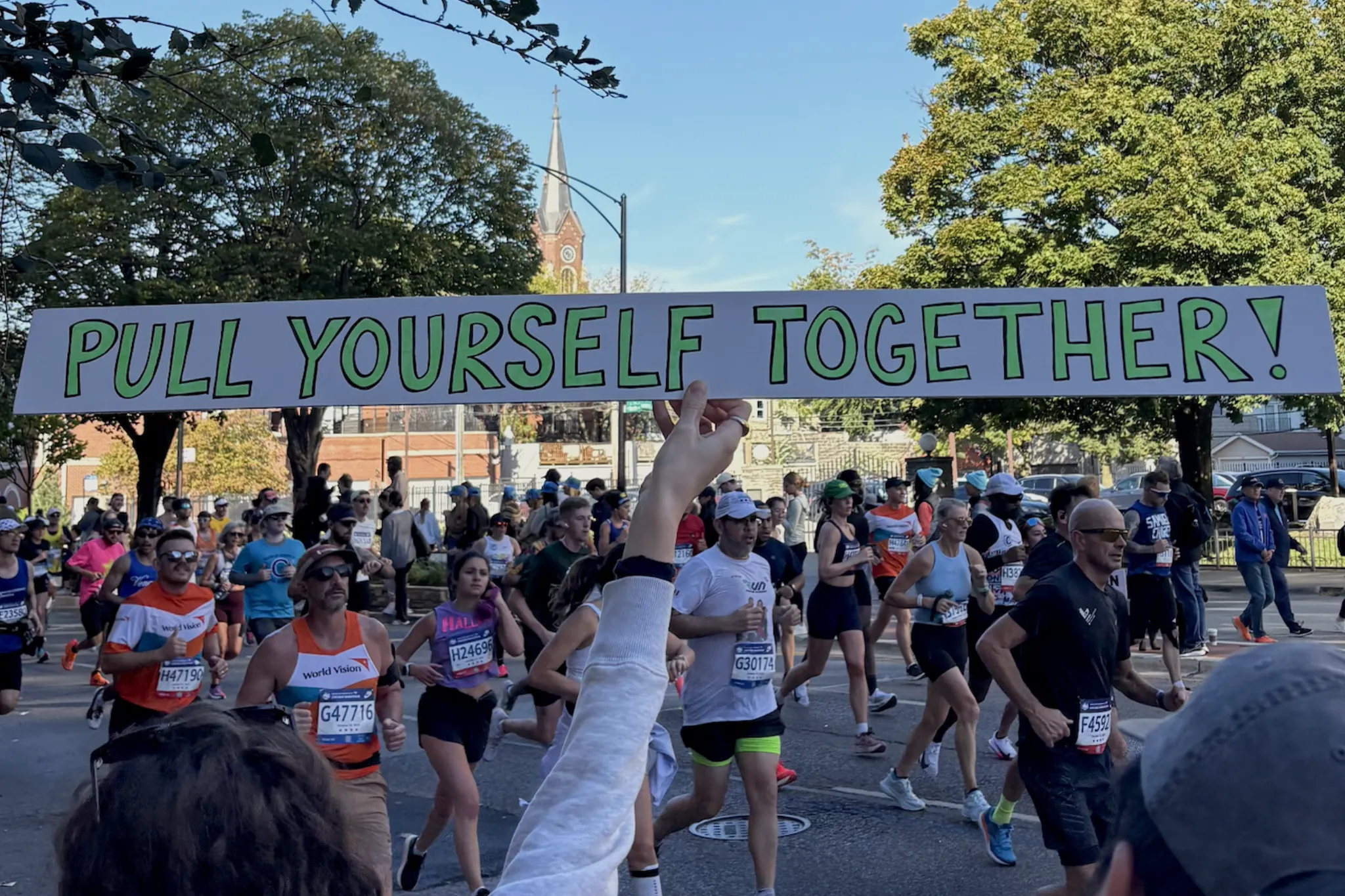 Spectators cheering on runners at the Chicago Marathon 2025.