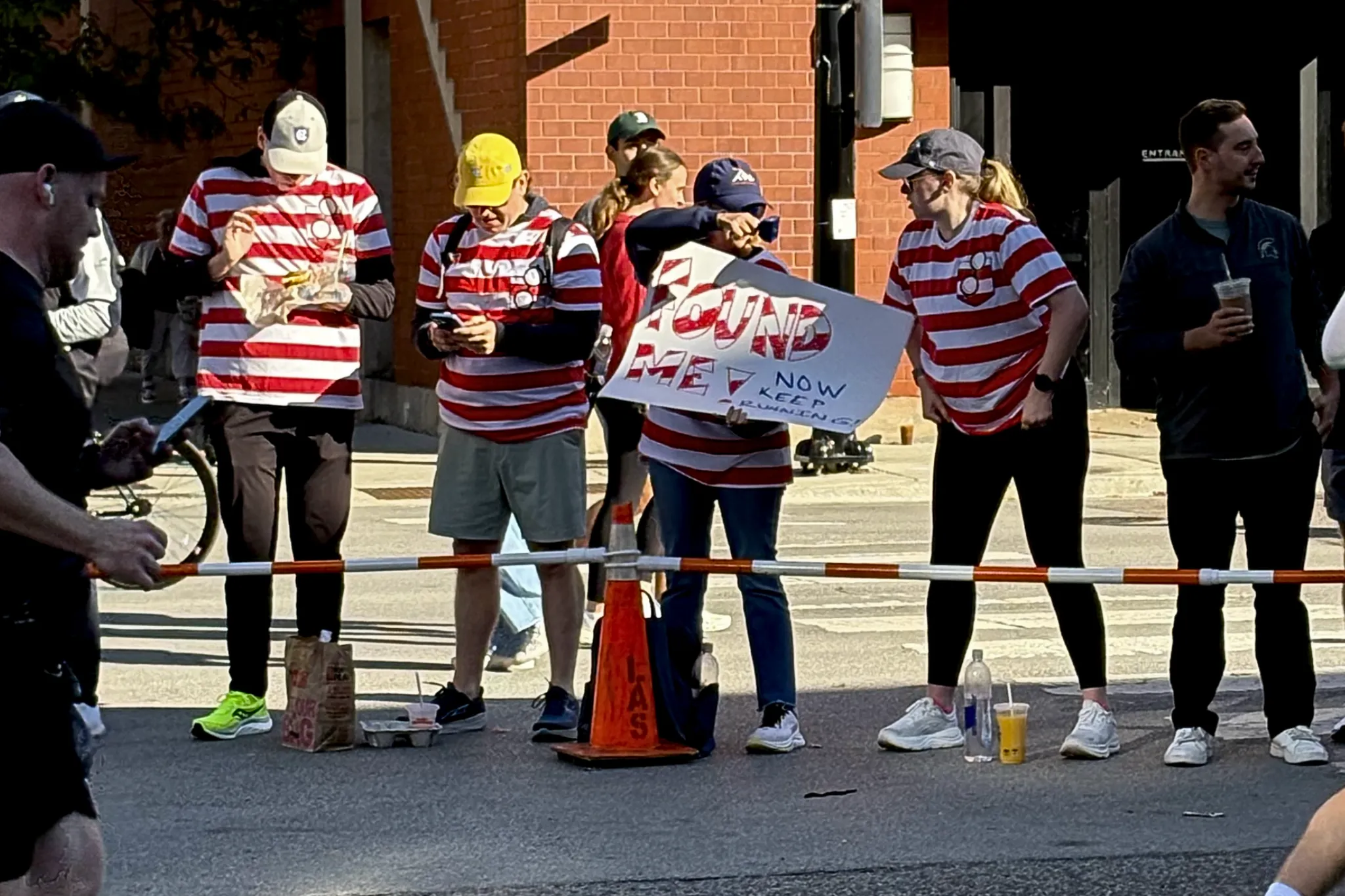 Spectators cheering on runners at the Chicago Marathon 2025.