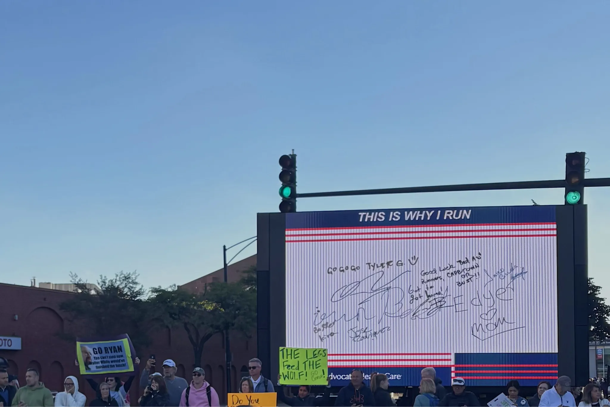 Spectators cheering on runners at the Chicago Marathon 2025.