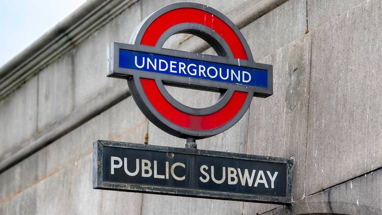 London Underground sign at a tube station