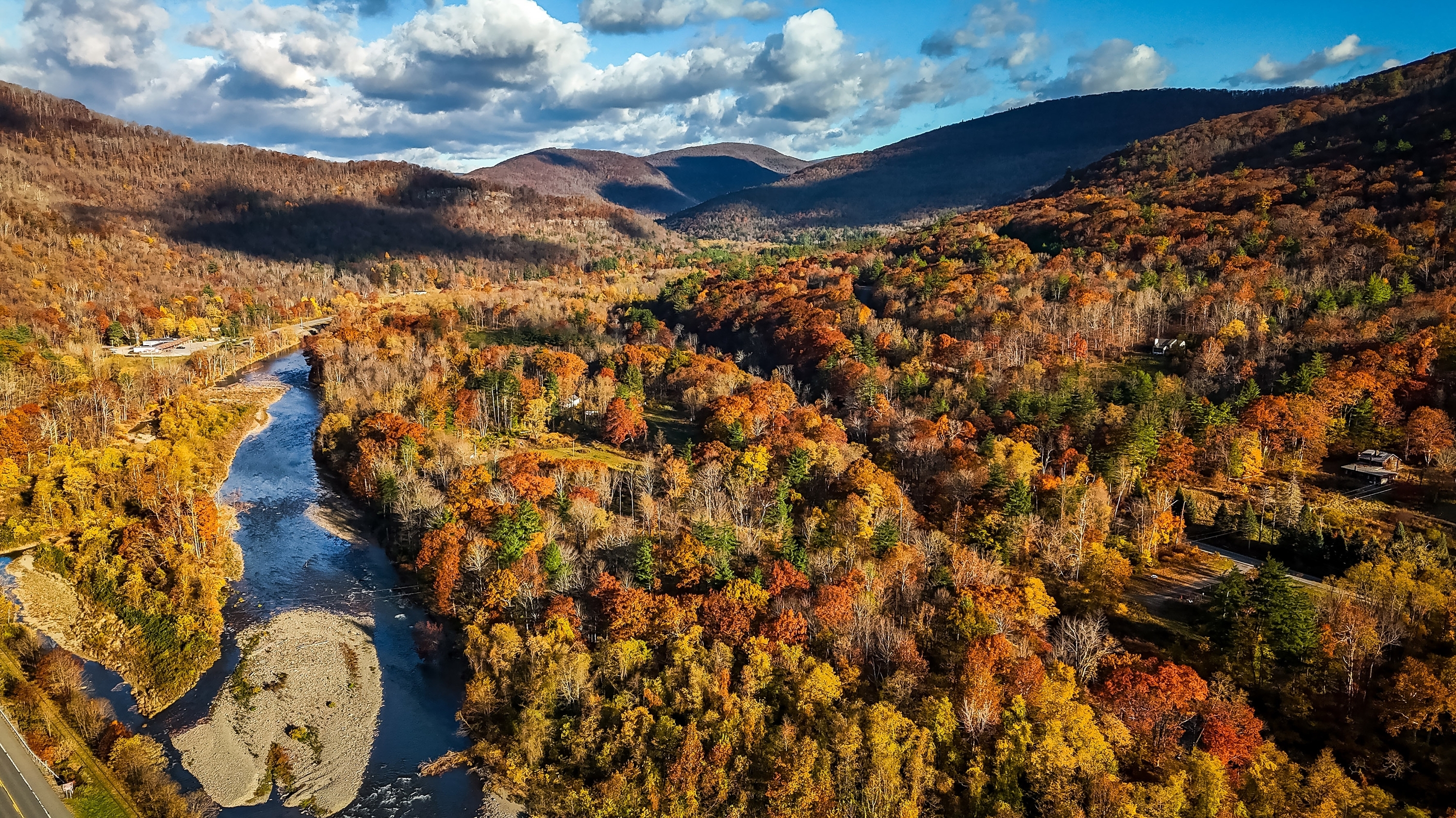 The Catskills with fall colors in the trees.