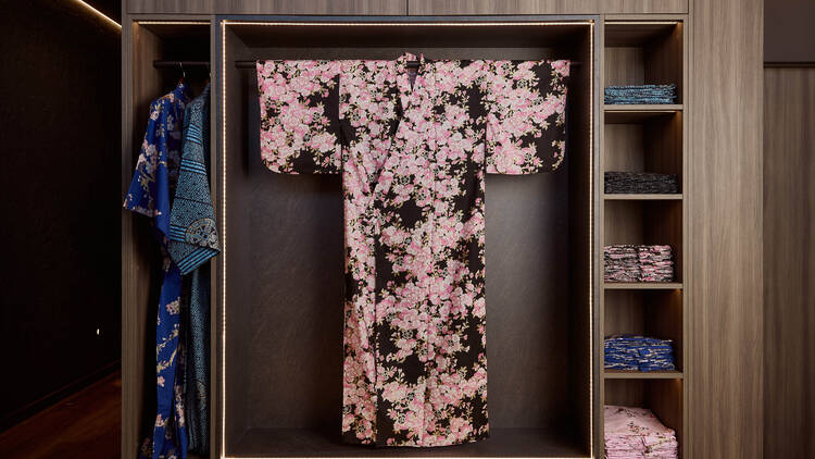 A kimono hanging in a wardrobe.