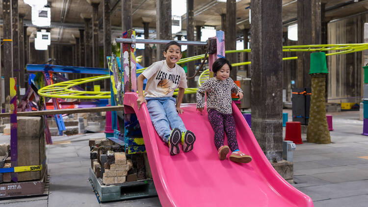 Kids on pink slide