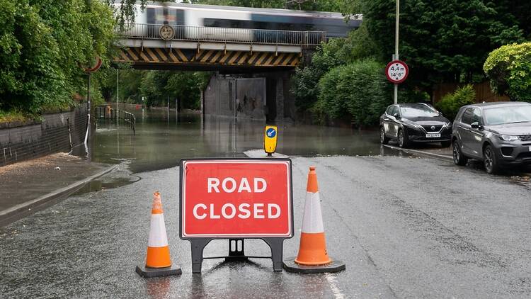 Road Closed sign in flooded Stockport, Manchester