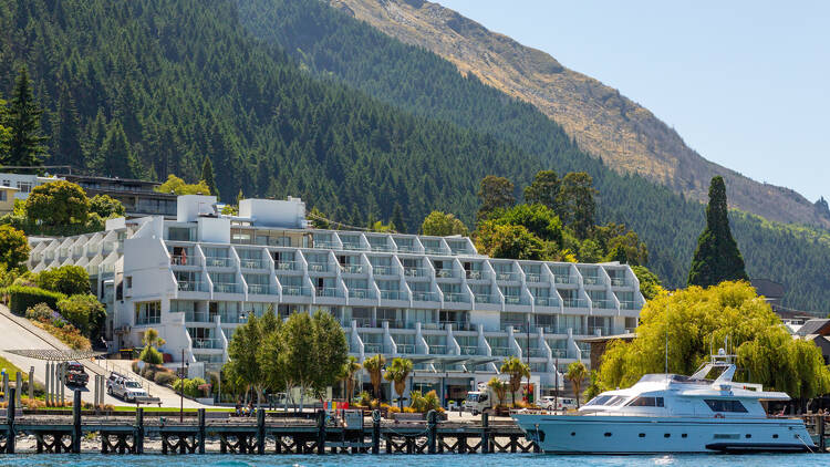 Exterior of hotel near lake